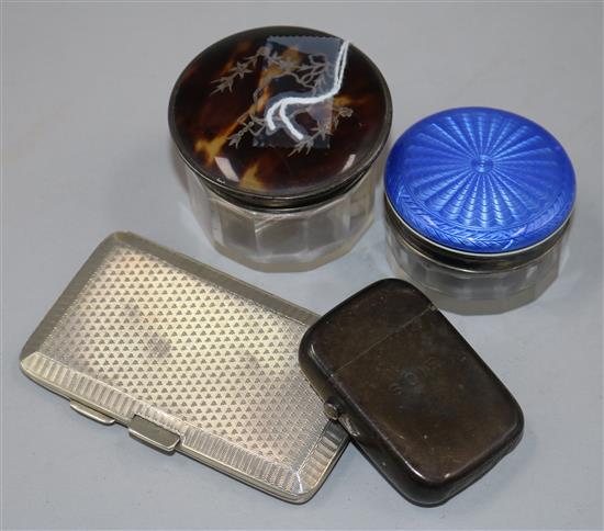 A George V tortoiseshell and silver mounted toilet jar, a silver cigarette case, a silver vesta case and a toilet jar.